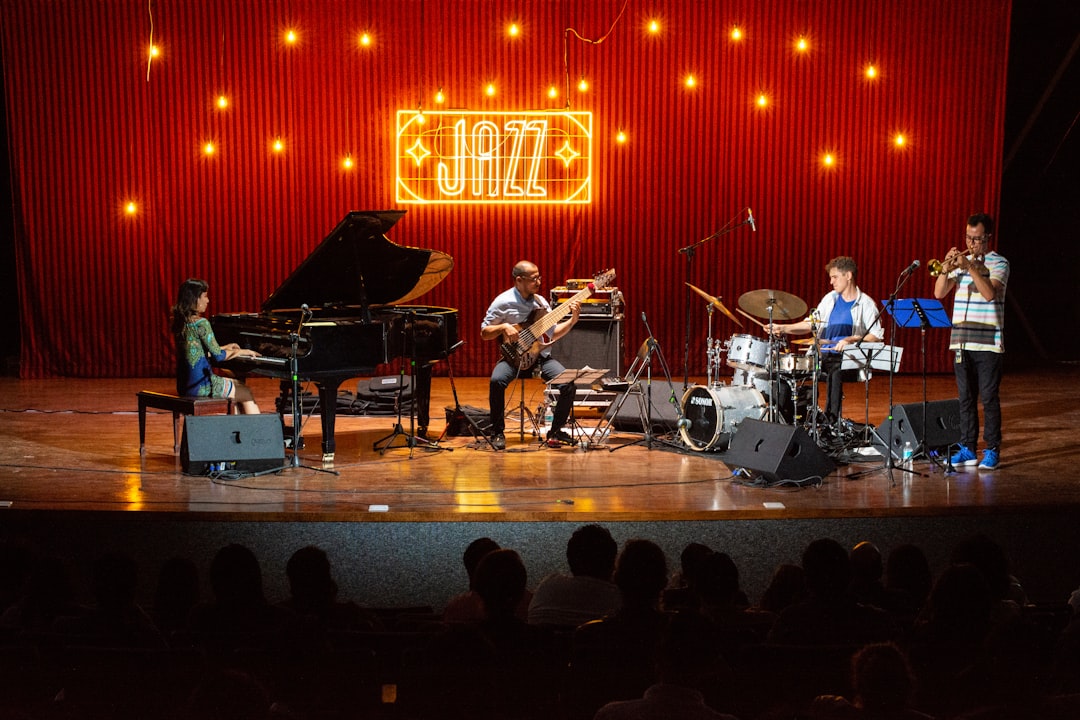 Musicians performing live on stage during an evening concert